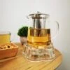 Glazen Theepot Met RVS Theefilter / Theezeef Inclusief Warmhouder ( Rechaud ) - Theelichthouder - Koffie Thee Coffee Tea Maker Luxe 1 Glazen Theepot Met RVS Theefilter / Theezeef Inclusief Warmhouder ( Rechaud ) - Theelichthouder - Koffie Thee Coffee Tea Maker Luxe -Bekerwinkel 900x1200 16